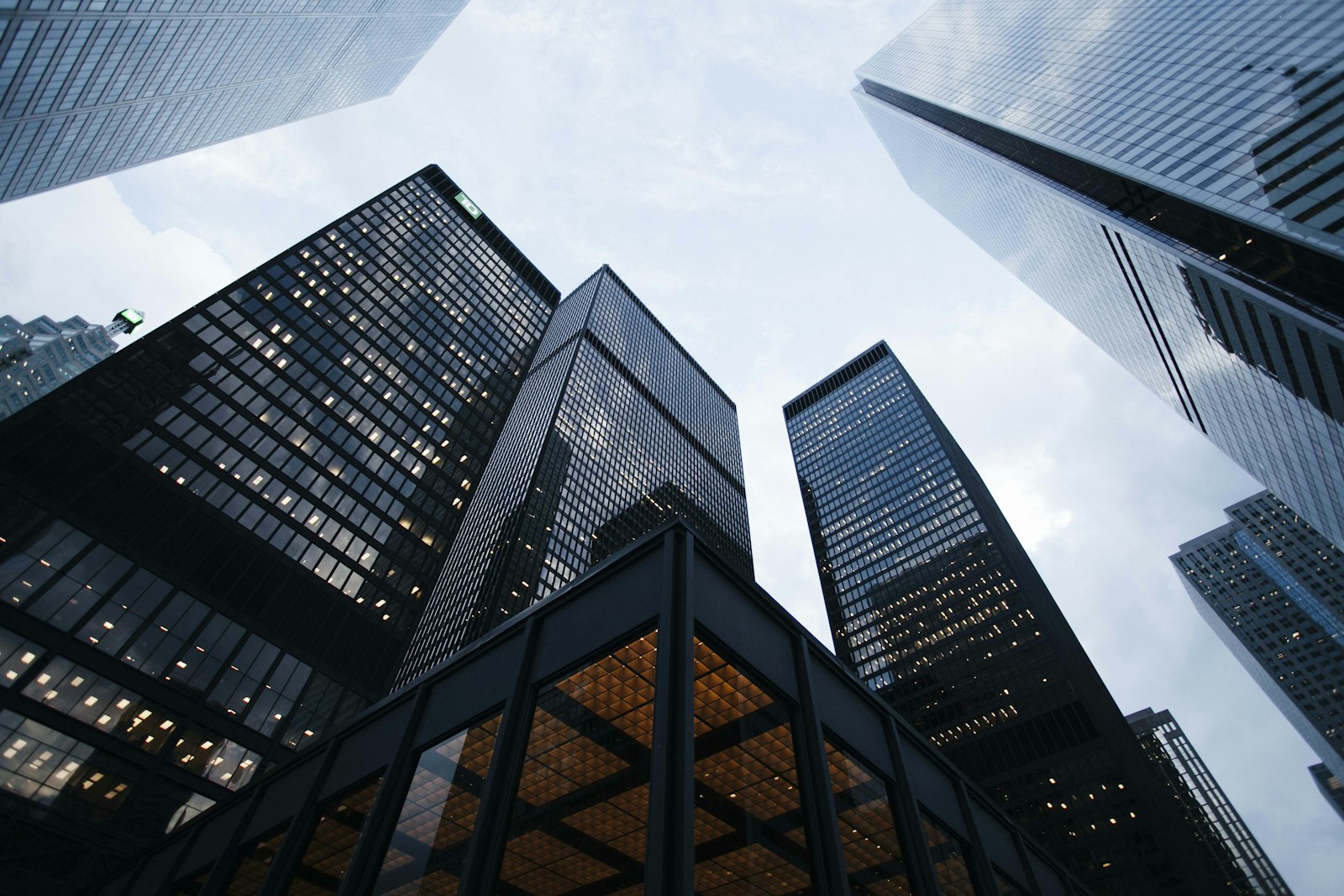 Dark glass towers rising against the sky